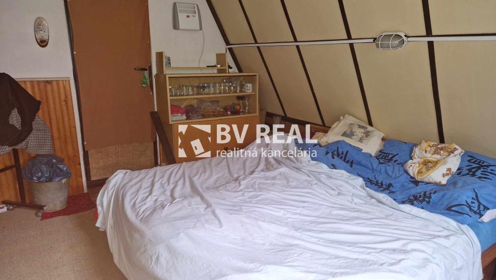 BV REAL Na predaj murovaná chata so záhradou Handlová FM2009