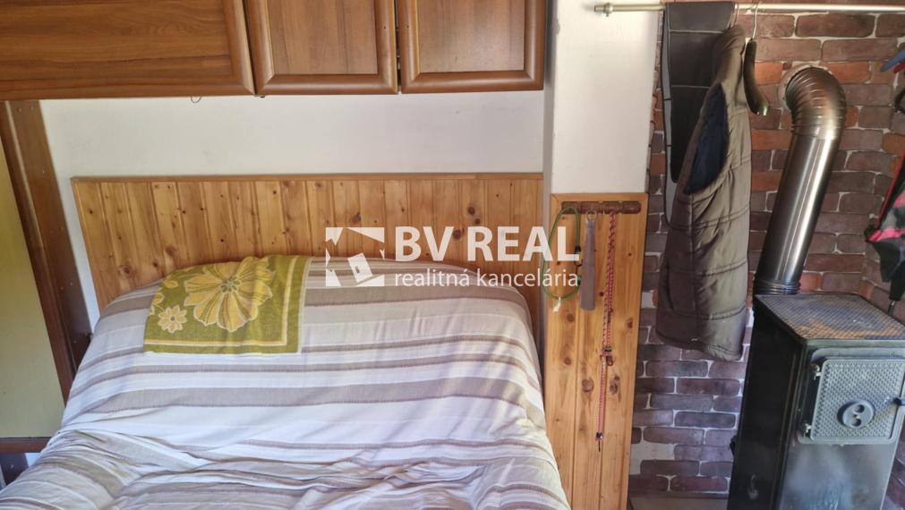 BV REAL predaj murovaná chata so záhradou Prievidza FM2285