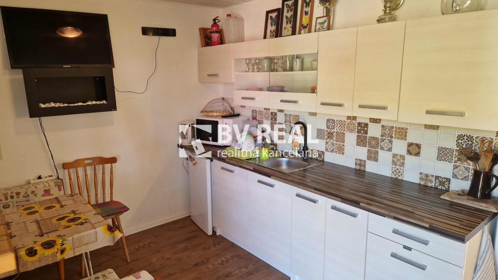 BV REAL predaj murovaná chata so záhradou Prievidza FM2356