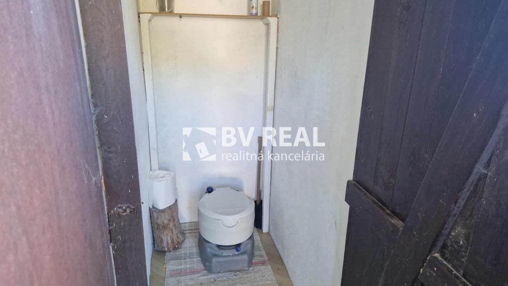 BV REAL predaj murovaná chata so záhradou Prievidza FM2356