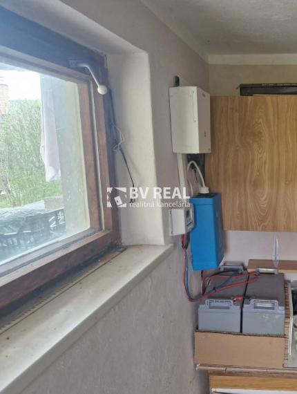 BV REAL murovaná chata so záhradou Prievidza FM2434