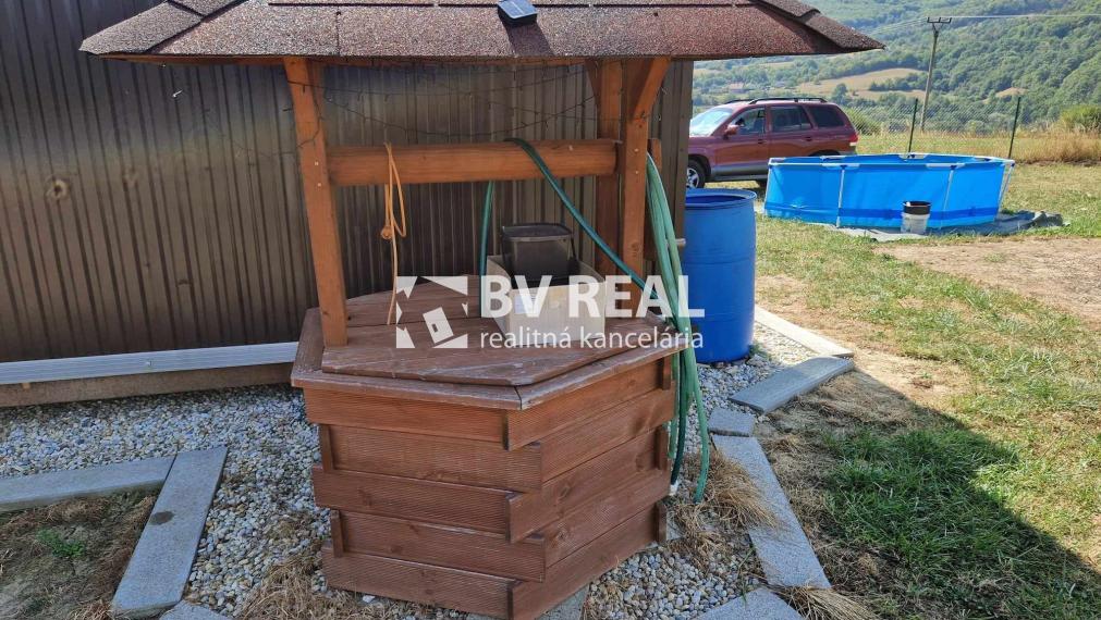 BV REAL Na predaj pozemok 1245 m2 s chatkou Nevidzany FM2107